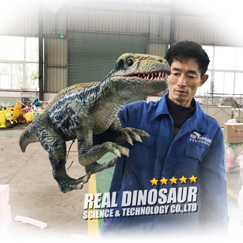 Animatronic Puppet Manufacturer - Handmade Holding Baby Dinosaur