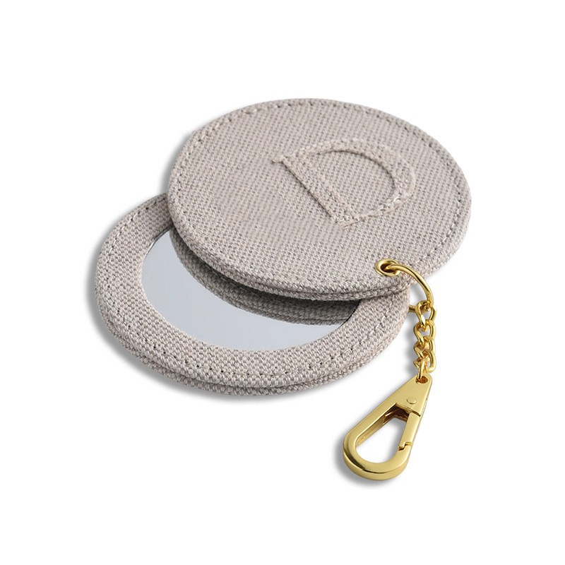 PU Leather Fabric Wrapped Circular Rotating Mirror Chain Keychain Hanging Bag Mirror Portable Small Gift Mirror