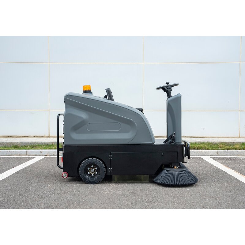 Battery Powered Ride-On Sweeper - Dust Control Factory