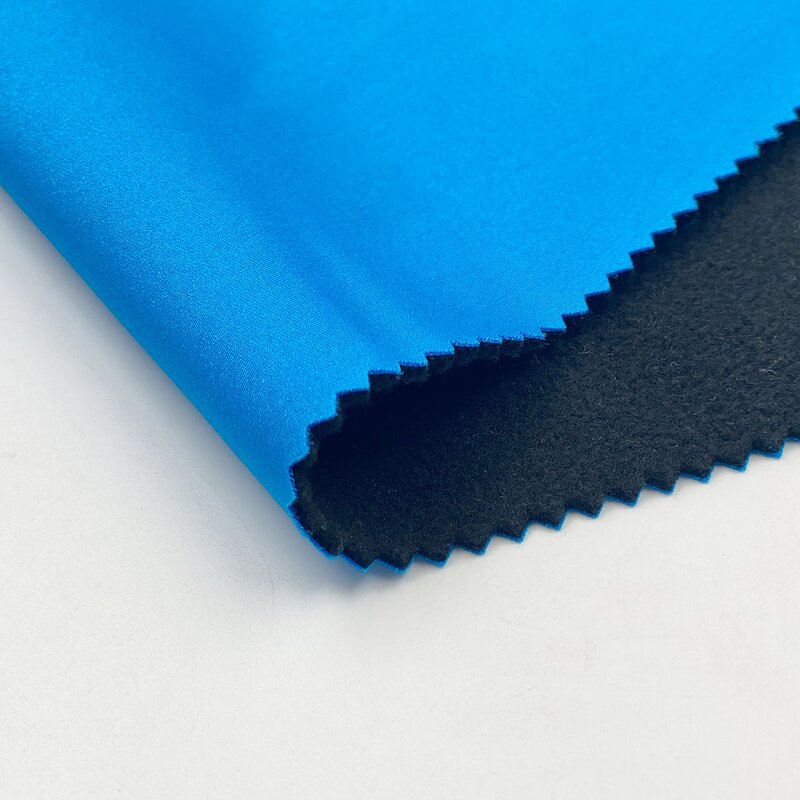 Softshell Fabric Manufacturer - Custom Poly Faux Sherpa 4 Way Stretch Fabric