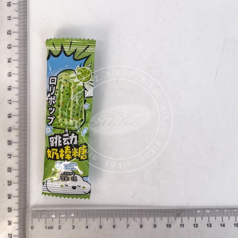 MILK LOLLIPOP WITH POPPING CANDY