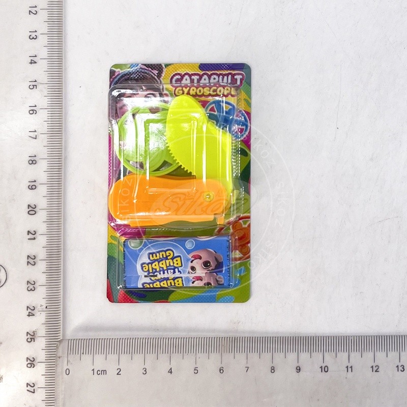 Peg-top toy and tattoo gum