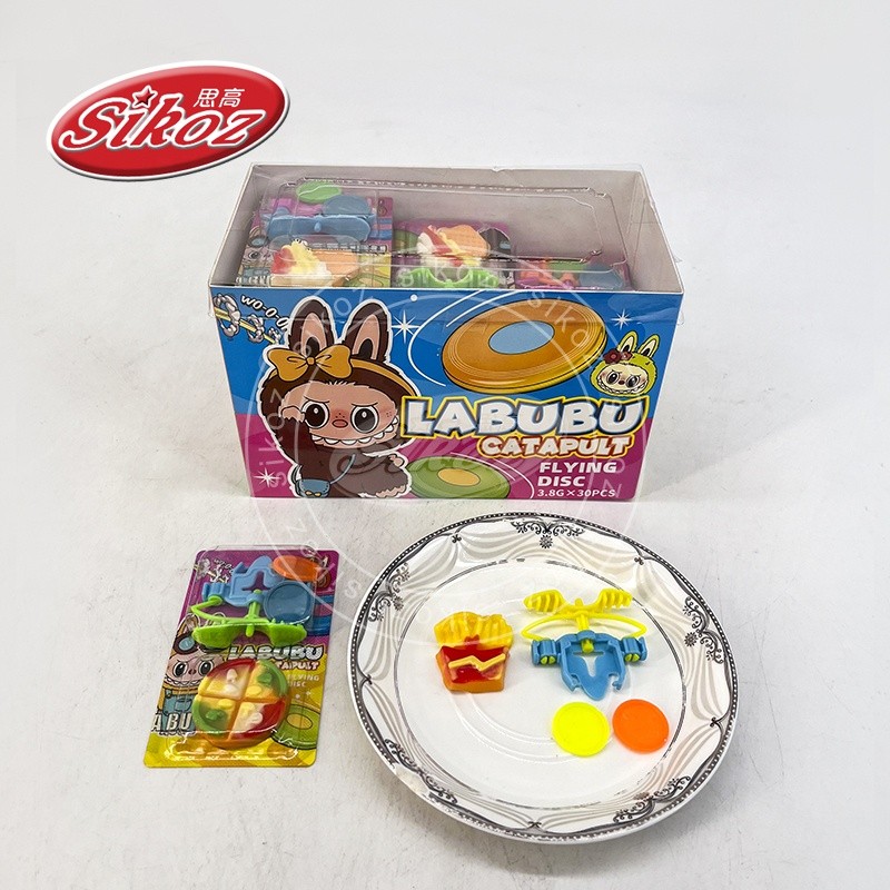 Fly toy and pizza gummy candy