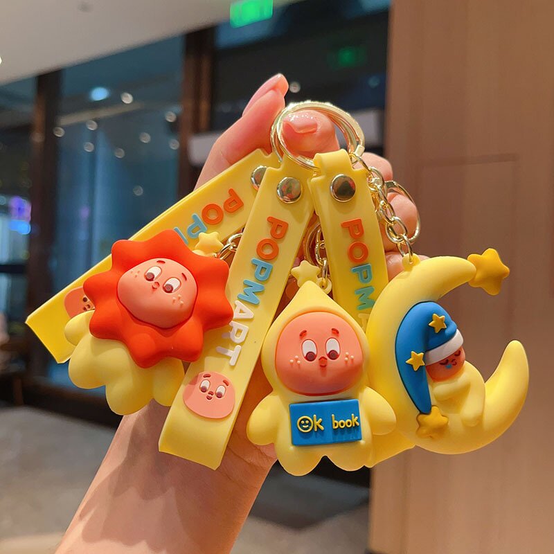 Rubber Keychain Manufacturer - OEM/ODM Cartoon Yellow Doll Car Pendant