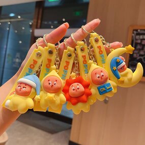 Rubber Keychain Manufacturer - OEM/ODM Cartoon Yellow Doll Car Pendant
