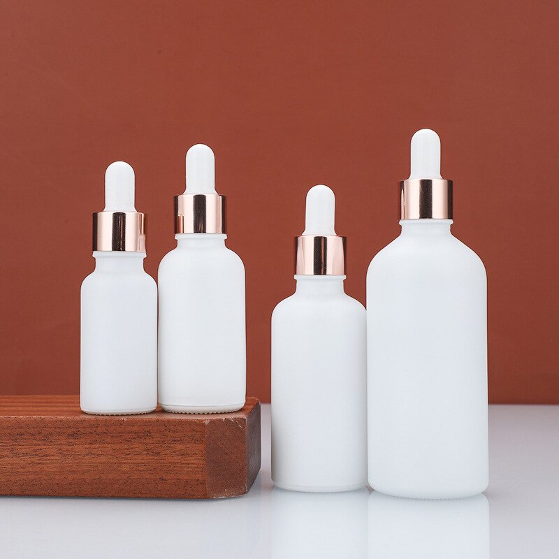 White Glass Essential Oil Bottle Factory - OEM 5-100ml Uv Coating with Gold Lid