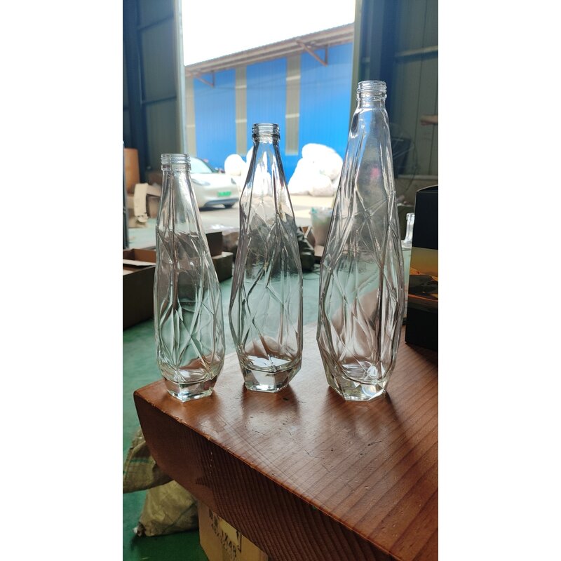 Glass Mineral Water Bottle Factory - OEM New 350-750ml Crystal White Material Fruit