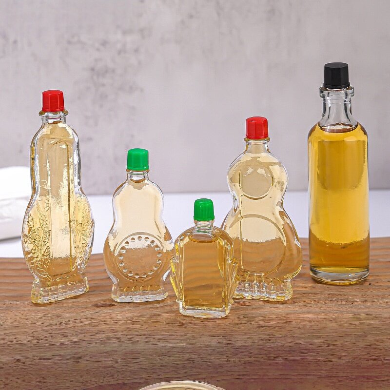 Clear Glass Wind Medicated Oil Bottle Manufacturer - OEM Wholesale Small Red Cap Empty
