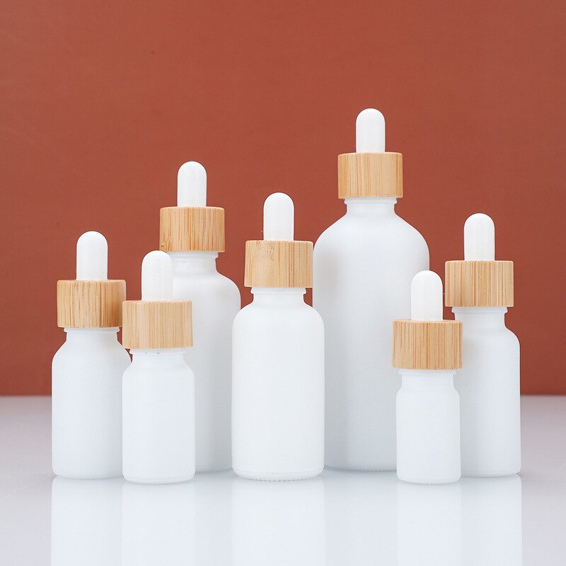 White Glass Essential Oil Bottle Factory - OEM 5-100ml Uv Coating with Gold Lid