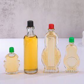 Clear Glass Wind Medicated Oil Bottle Manufacturer - OEM Wholesale Small Red Cap Empty