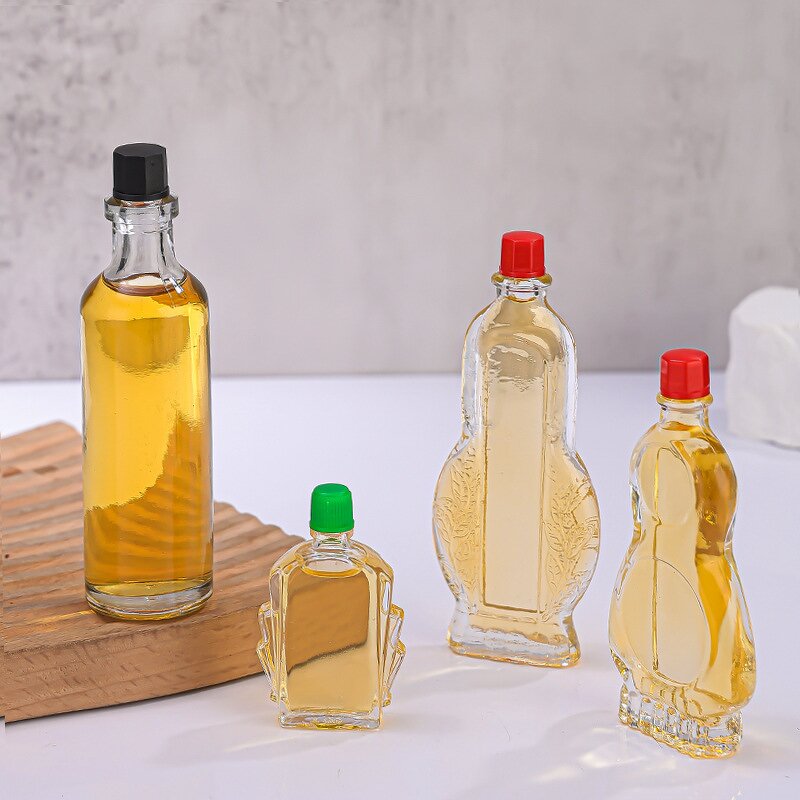 Clear Glass Wind Medicated Oil Bottle Manufacturer - OEM Wholesale Small Red Cap Empty