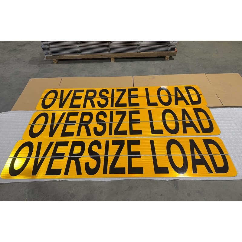 Oversize Load Banner Manufacturer - 18\" X 84\" Reversible with Bungees