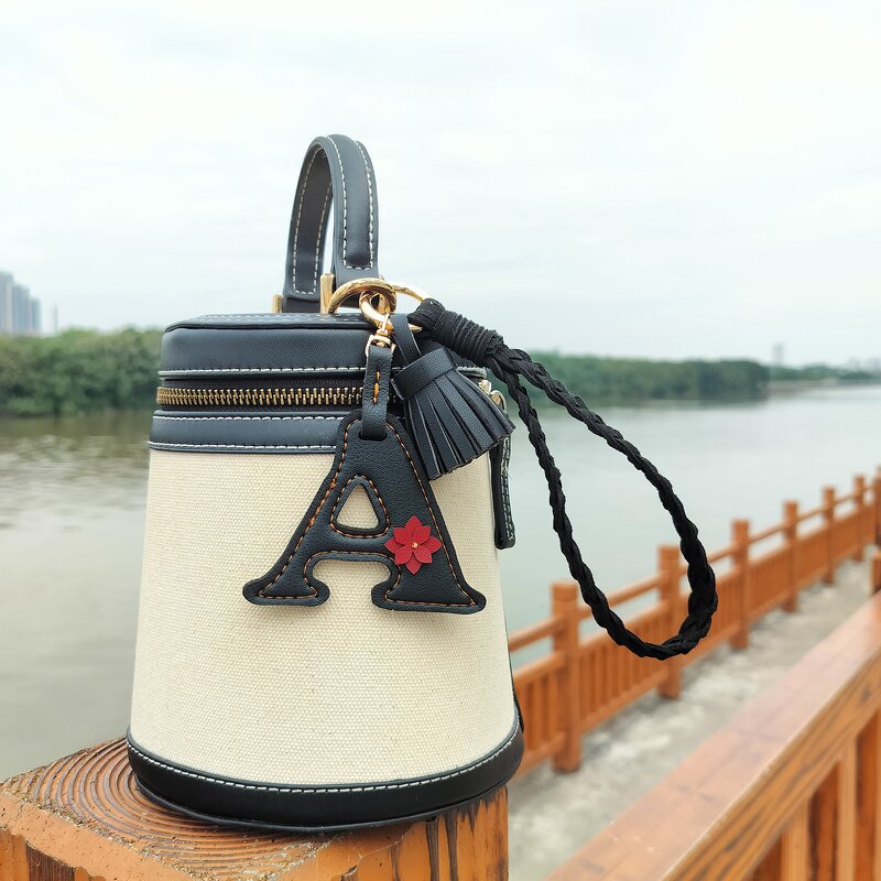 Keychain Factory - Black Leather Letter Keychain Woven Wrist Strap