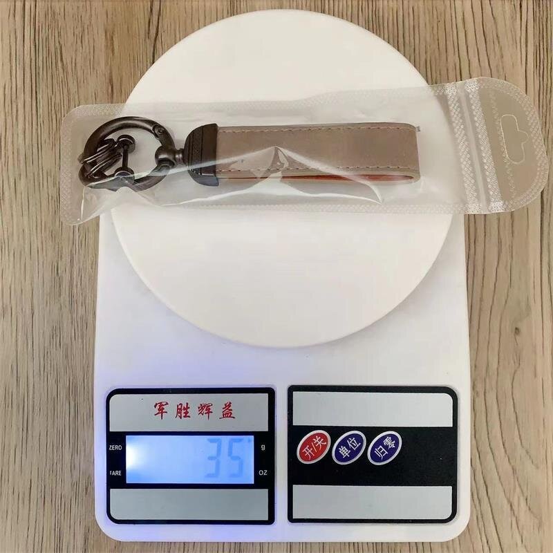 Keychain Manufacturer - OEM/ODM Custom Embossed Logo Suede Keychain