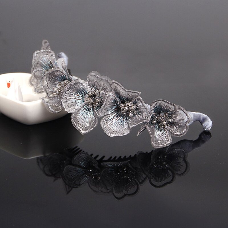 Banana Clip Factory - OEM Custom Embroidered Flowers & Twist Design