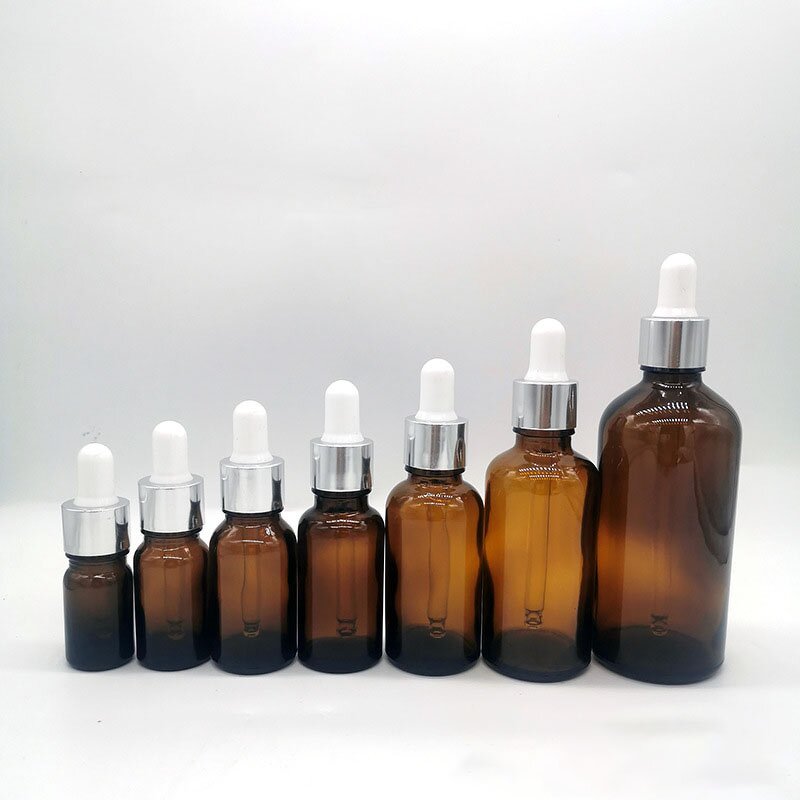 Glass Dropper Bottle Manufacturer - In Stock 30ml 50ml 100ml Transparent Amber Glass Essential Oil with Gold and Silver
