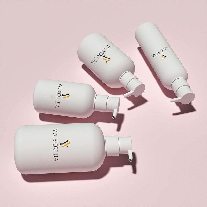 Wash Bottle Manufacturer - Stock 200ml 260ml 300ml 400ml 500ml HDPE Plush White Press Round Shoulder Dispenser Shampoo