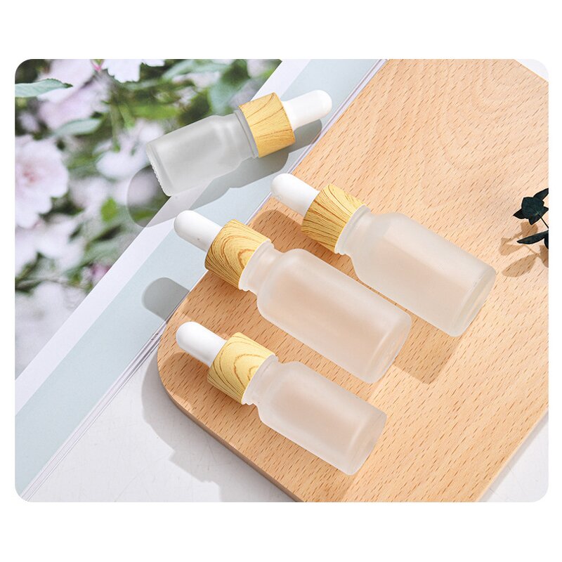 Glass Dropper Bottles Manufacturer - Hot Sale Matte White Wood Grain Lid 20ml Essential Oil 40ml Capacity Sizes 5ml 10ml