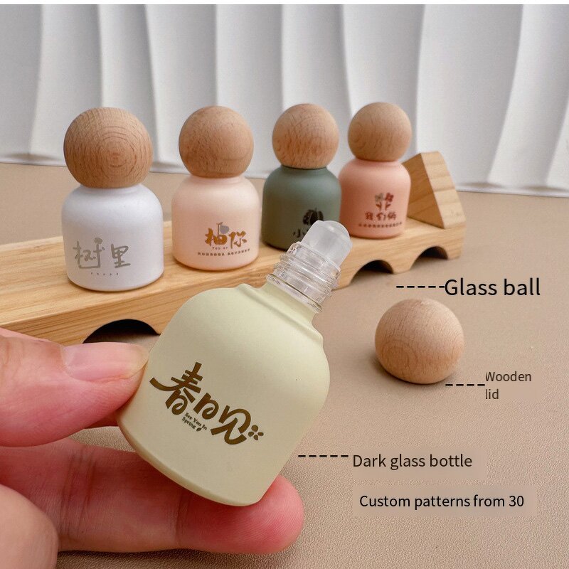 Essential Oil Bottle Manufacturer - Luxury Bamboo Lid Glass Body 10ml Round Roll-On for Face Cream Custom Color Screen