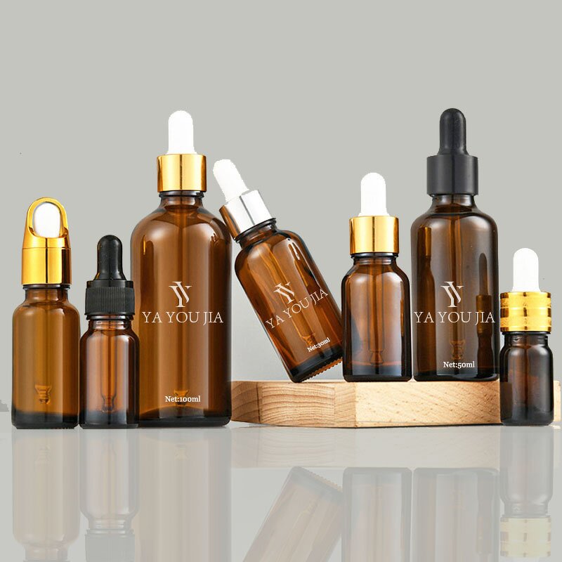 Glass Dropper Bottle Manufacturer - In Stock 30ml 50ml 100ml Transparent Amber Glass Essential Oil with Gold and Silver
