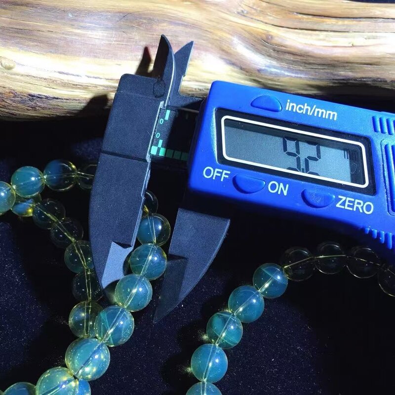 Blue Amber Crystal Ornament Manufacturer - 2A Grade Mexican 9mm Excellent Blue Hue with Volcanic Ash Handmade