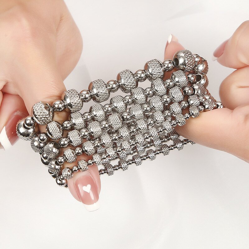 Stainless Steel Spacer Bead Bracelet Manufacturer - Wholesale No Fade Color Shiny Silver Color Textured Round Ball Elastic