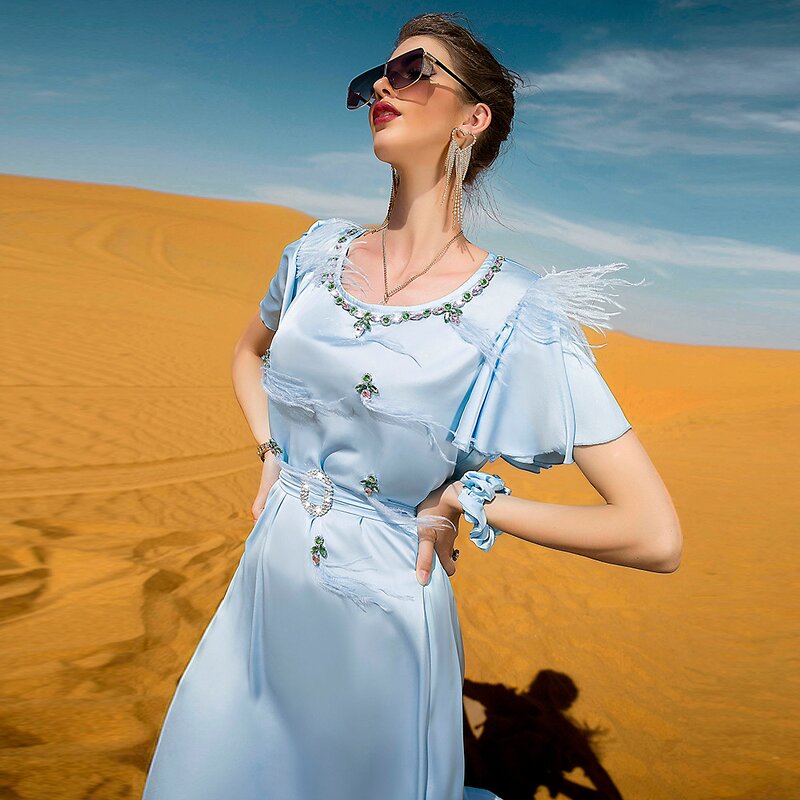 Muslim Style Dress Manufacturer - Light Blue Satin Surface Lotus Leaf Feather Hand Sewing