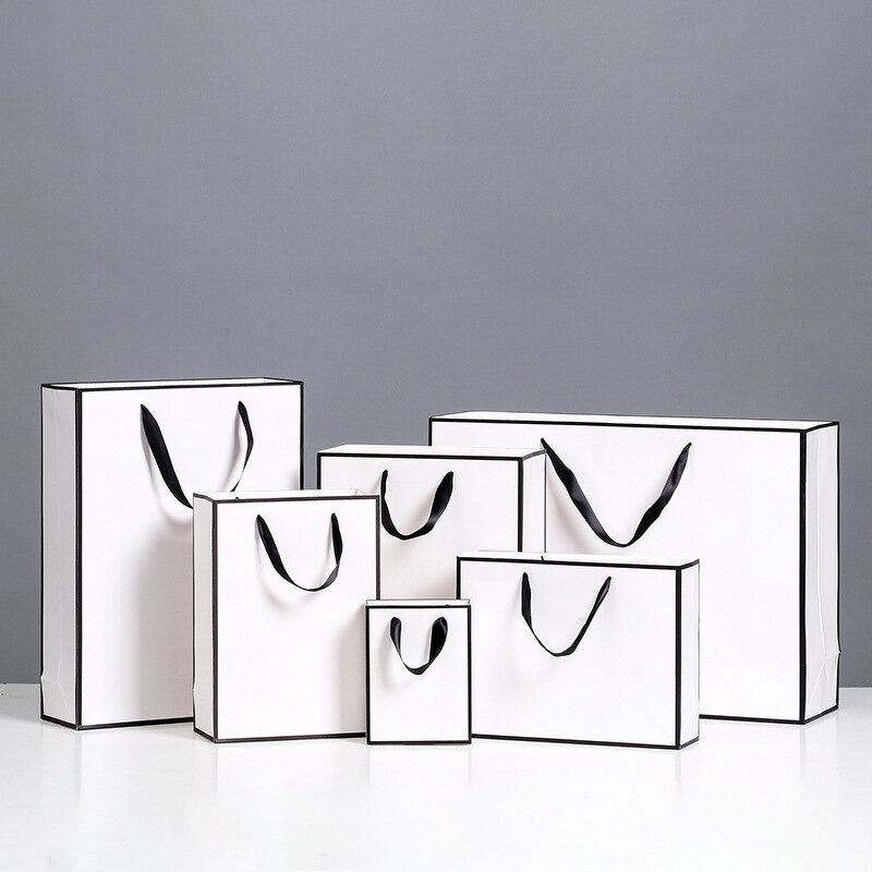 Cardboard Shopping Paper Bag Manufacturer - YC Luxury Eco-Friendly Art Gift Women's Clothing Packaging White With Black Line Edges