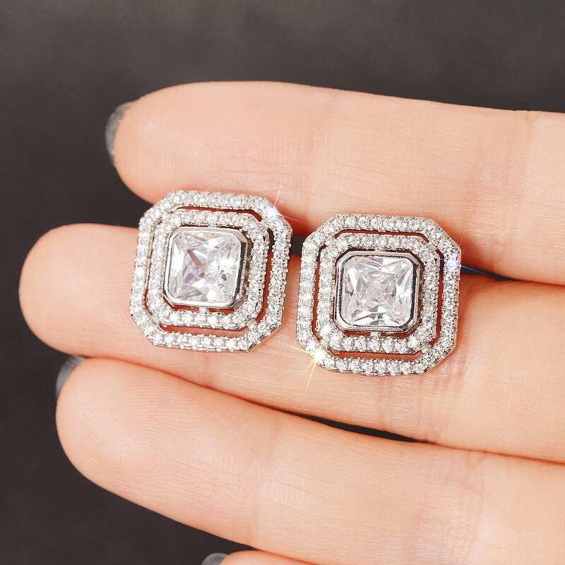 Earrings Manufacturer - OEM Luxury Geometric Twist Design Red Crystal Zircon Stud
