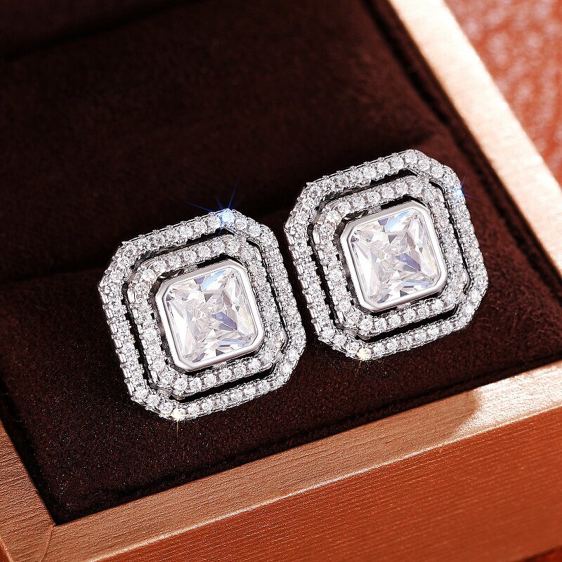 Earrings Manufacturer - OEM Luxury Geometric Twist Design Red Crystal Zircon Stud