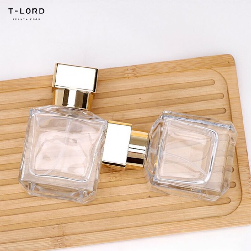 Custom 70ml Square Glass Perfume Bottle with Gold Cap Cosmetic Pump Sprayer for Containers Packed in Cartons