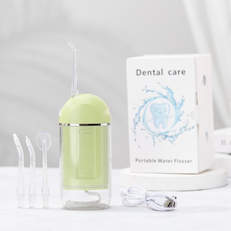 Mini Electric Water Flosser - 4 Nozzles IPX7 Waterproof Detachable Travel Tool