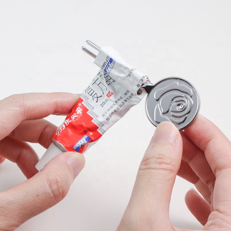 Tube Squeezer - Manufacturer - Silver Cartoon Shape Metal Rolling Toothpaste Dispenser