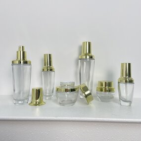 Skincare Bottles Manufacturer - Transparent Glass with Gold Cap 30g to 120g for Cream & OEM
