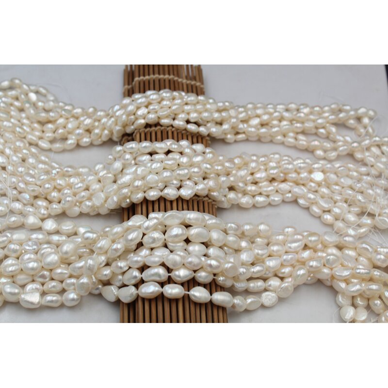 Pearl Necklace - Manufacturer 4-10MM White Nucleated Baroque Freshwater