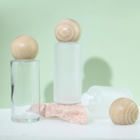 Essential Oil Bottle Supplier - 50ml Round Wood Cover Glass Perfume Oil Bottle with Plug